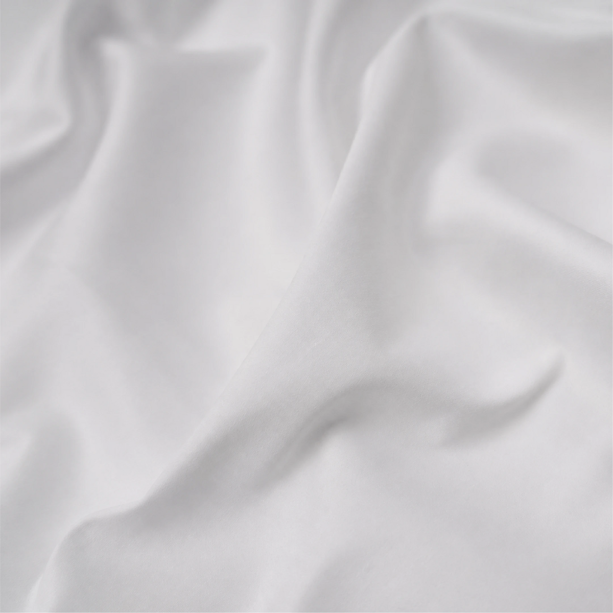 Close-up of smooth white Imported Lycra Satin Shirting Fabric