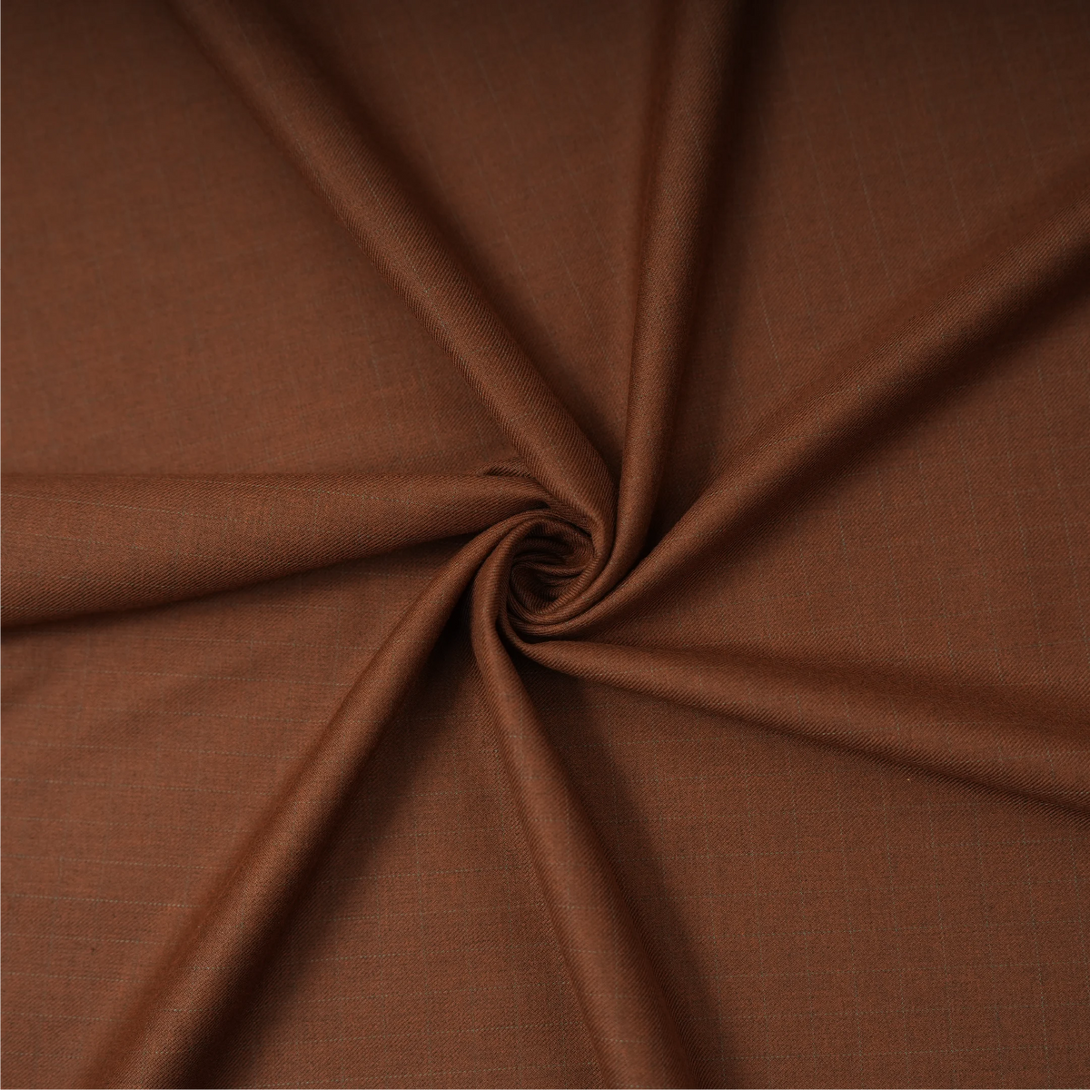 Raymond Bellismo rust brown suiting fabric arranged to show its smooth texture and drape