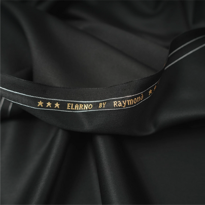 Close-up of Raymond Elarno black suiting fabric with branded selvedge