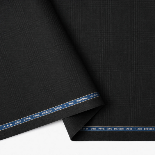Raymond Exotic Merino Wool 100 black self-check suiting fabric showing its fine texture